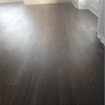 Balsoon House, Co. Meath: 7 inch American oak plank floor installation - finished with a custom Rubio Monocoat 2c, colour of charcoal and pure, mixed 3 to 1. Solid wood floor installation by Jonathan Doyle of AD Sanding & Varnishing, Kilkenny, Ireland