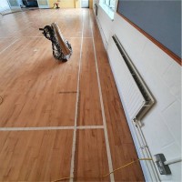 Before makeover of solid beech floor in Drumphea National School, Co. Carlow, Ireland by AD Sanding & Varnishing, Ireland