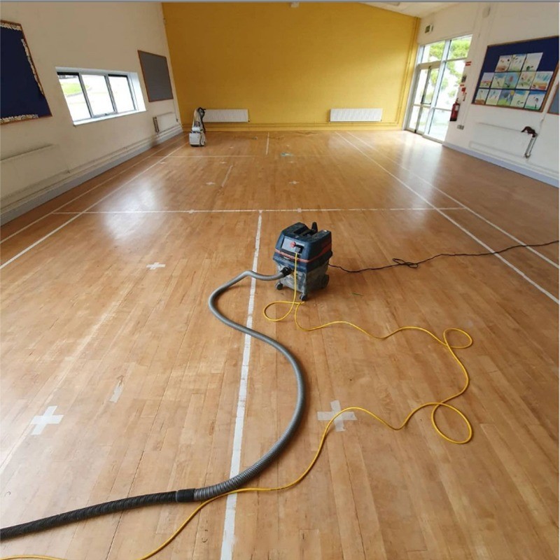 Before makeover of solid beech floor in Drumphea National School, Co. Carlow, Ireland by AD Sanding & Varnishing, Ireland