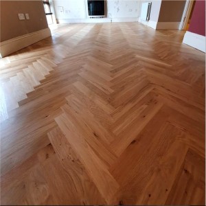 Herringbone parquet flooring, fitted over new, level subfloor with liquid Damp Proof Membrane (DPM) applied. Floor finished with 3 coats of Woca Optima silk gloss. Flooring installation by Jonathan Doyle of AD Sanding & Varnishing, Kilkenny, Ireland