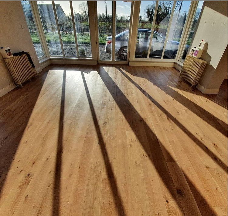 After renovation of oak floor.  Floor has been finished with 3 coats of Woca Optima Slik gloss lacquer. The natural beauty of the oak flooring has been restored by Jonathan Doyle of AD Sanding & Varnishing, Kilkenny, Ireland