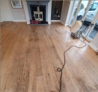 Before renovation of oak floor: one of the worst floors we've ever come across, this oak floor was finished by the building contractor 19 years ago and hadn't been touched since. AD Sanding & Varnishing, Kilkenny, Ireland