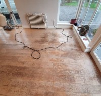 Before renovation of oak floor: one of the worst floors we've ever come across, this oak floor was finished by the building contractor 19 years ago and hadn't been touched since. AD Sanding & Varnishing, Kilkenny, Ireland